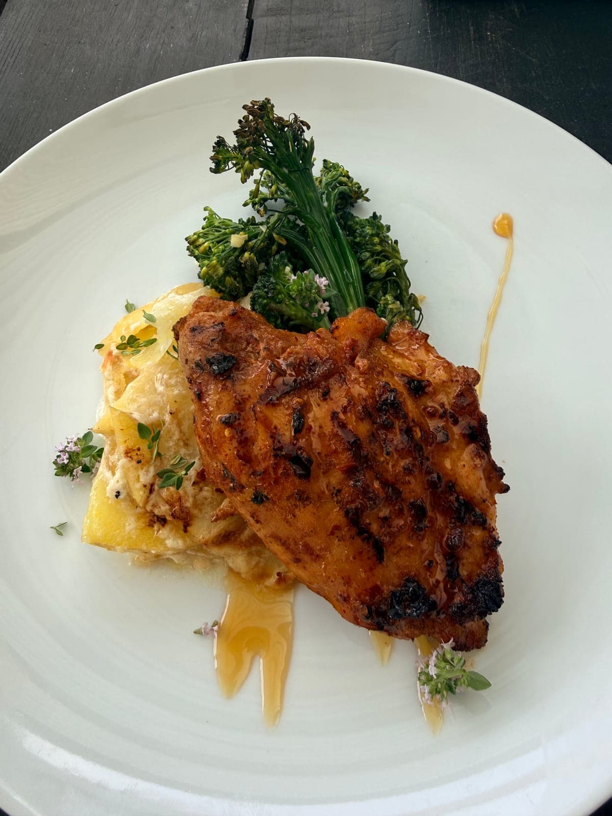 Grilled chicken with broccolini and potato gratin